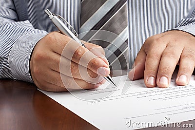 Businessman Signing Contract Document