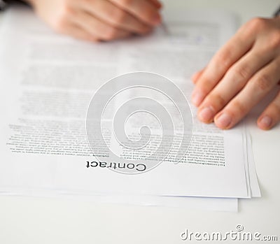 Businessman Signing a Document