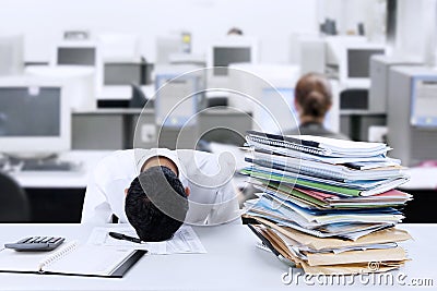 Businessman sleeping at desk