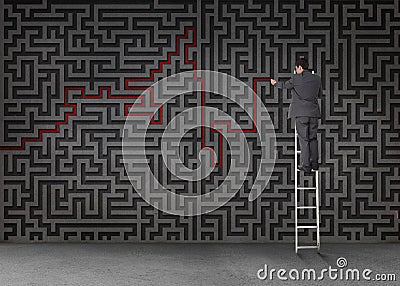 Businessman standing on a ladder and drawing a red line through