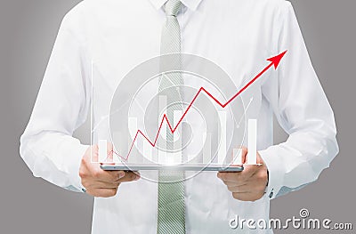 Businessman standing posture hand graph on tablet