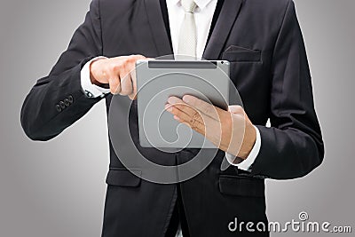 Businessman standing posture hand holding blank tablet