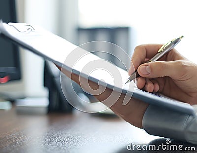 Businessman taking business notes