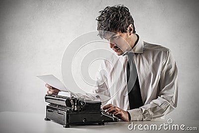 Businessman typing on the typewriter