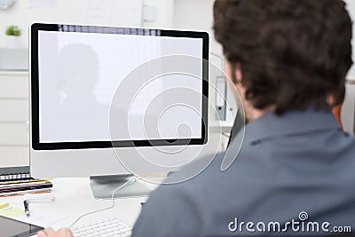 Businessman using a desktop computer