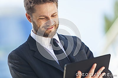 Businessman Using Tablet Computer