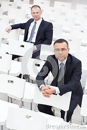 Businessmen in conference hall