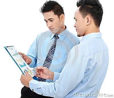 Businessmen discussing a business chart growth