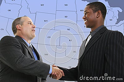 Businessmen Handshake in Front of Blue US State Map