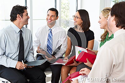Businesspeople Having Informal Meeting