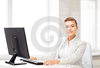 Businesswoman with computer in office