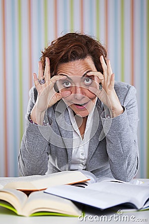 Businesswoman holding her eyes open