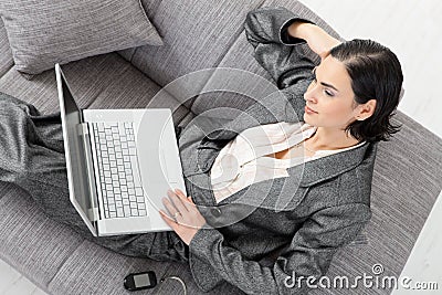 Businesswoman sitting on sofa