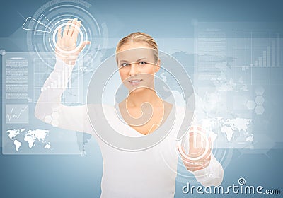 Businesswoman touching virtual screen