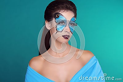 Butterfly fashion makeup on face beautiful woman.