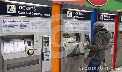 Buy train tickets from automatic vending machine