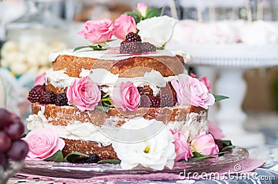 Cake with fruit and roses