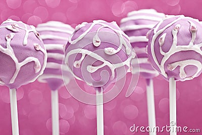 Cake pops on pink background