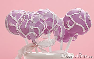 Cake pops on pink background