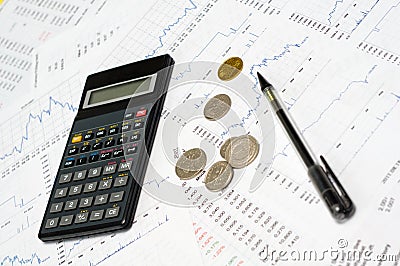 Calculator, money, graph and pencil