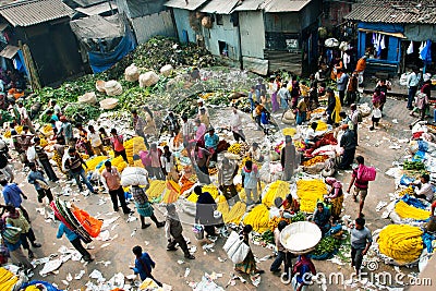 CALCUTTA, INDIA: View of Mullik Ghat Flower Market with people scurrying around