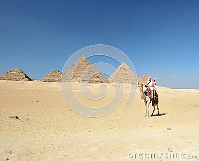 Camel ride by Giza pyramids