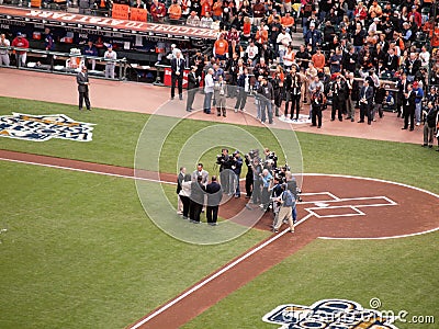 Camera crews film as Tim Wakefield shakes hands