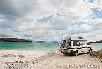 Camper van parked on a beach in the Isle of Lewis