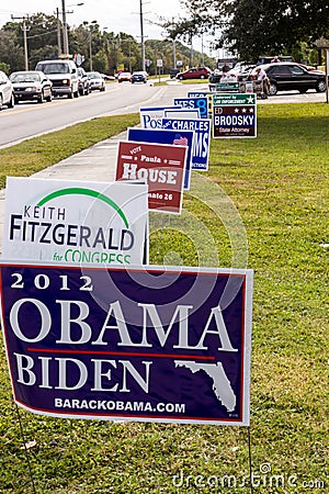 Candidate signs outside polling place during presidential election