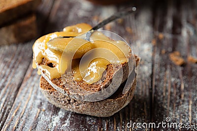 Candied golden honey on whole grain bread