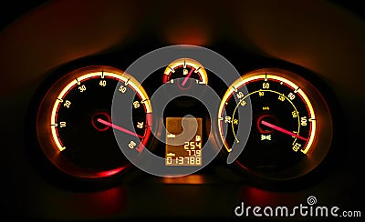 Car dashboard dials at night