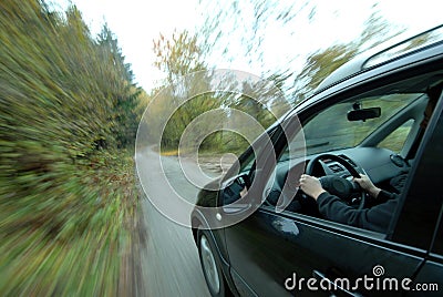 Car driving on country road