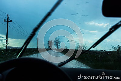 Car driving in rain