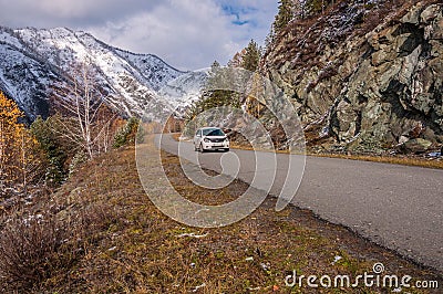 Car driving road mountains snow autumn