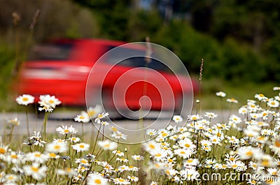 The car moves along the road at high speed