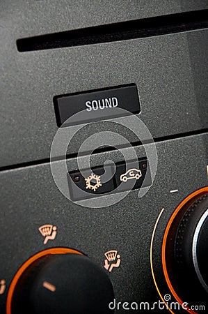 A car radio with light orange