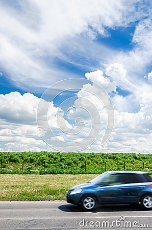 Car speeding along country road