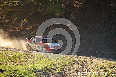 Car speeding on dust gravel