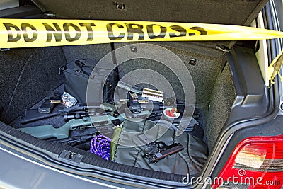 Car trunk full of guns