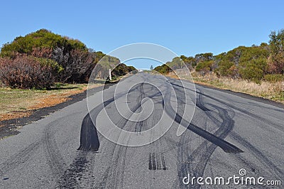 Car tyre tire skid marks on urban asphalt road