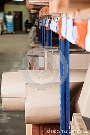 Cardboard Rolls And Boxes Stored In Warehouse