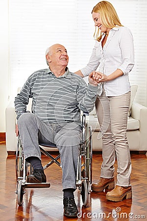 Caregiver helping senior citizen