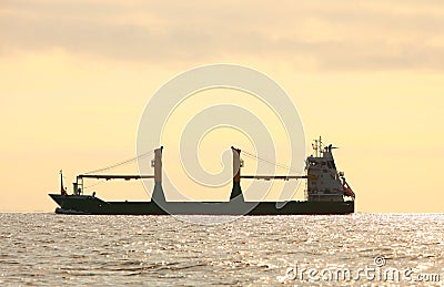 Cargo conteiner ship sailing in still water