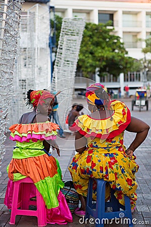 Caribbean women dressed with colors
