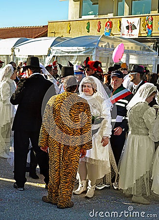 Carnival people in masks