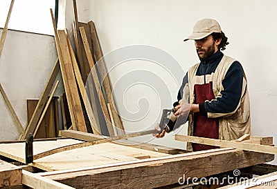 Carpenter Making Furniture Royalty Free Stock