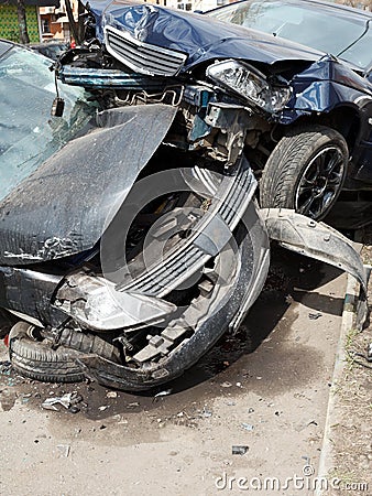 Cars damaged during road accident