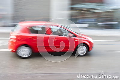 Cars Driving Fast in City