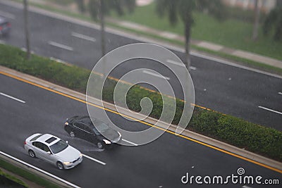 Cars driving in the rain