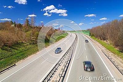 Cars on the highway near Gdansk in sunny day